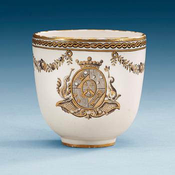713. A Swedish Marieberg Armorial soft paste cup, dated 1781.