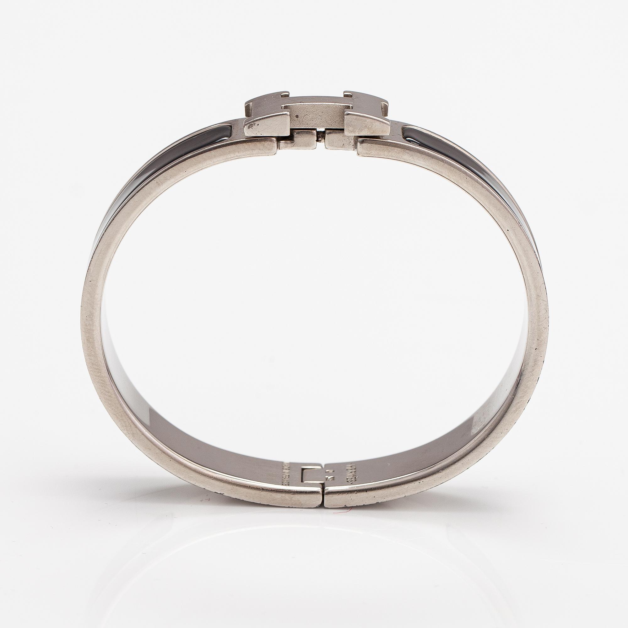 Hermès, armband, "Clic H PM", silverfärgad metall och svart emalj.
