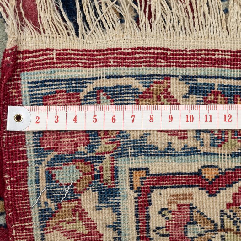 An antique Kerman Raver rug, ca 225 x 141 cm.