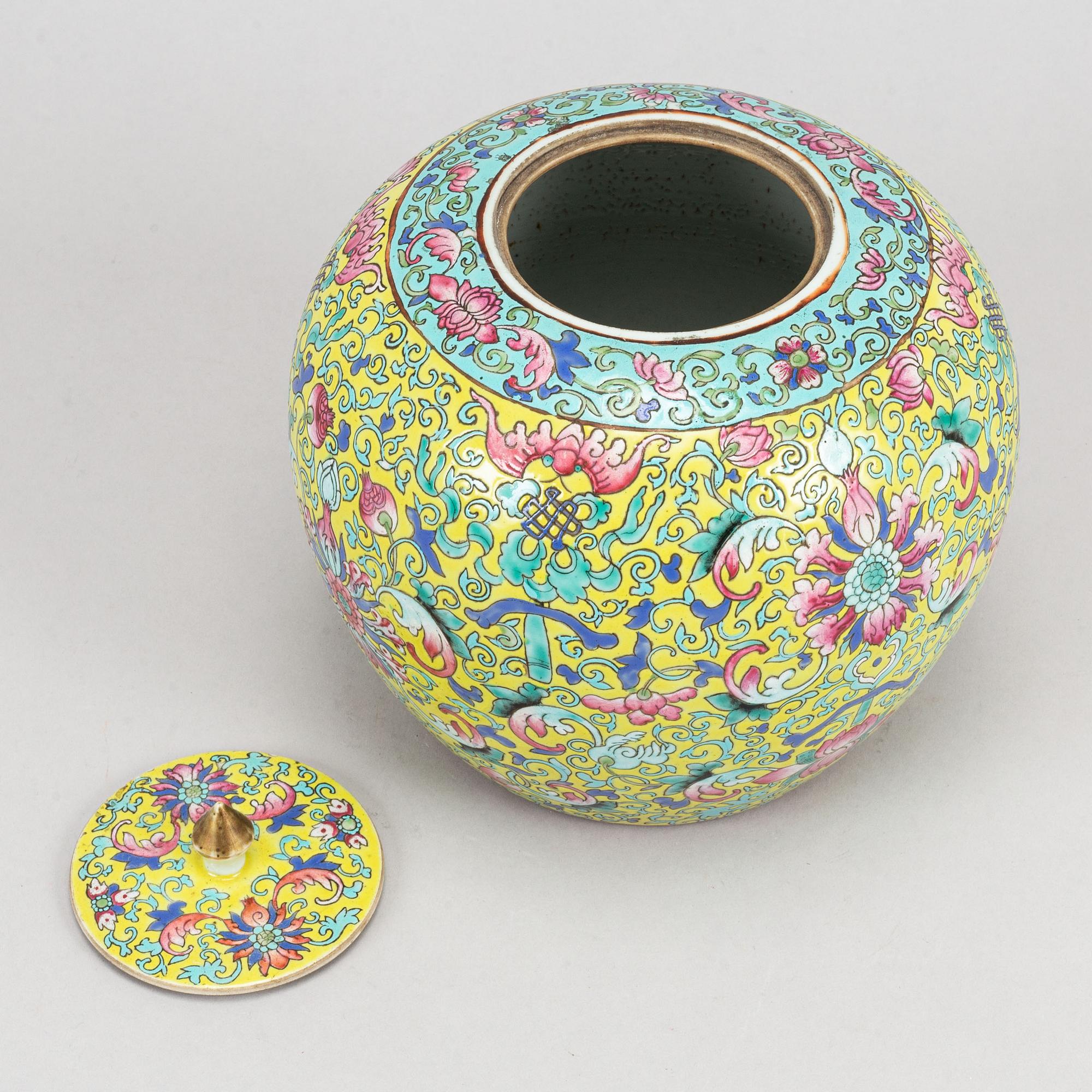 A yellow ground famille rose lotus jar, China, early 20th Century.