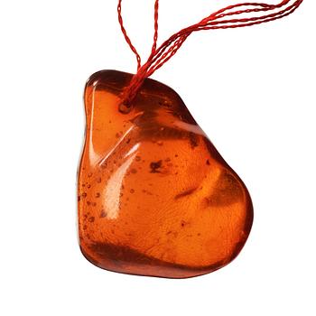 A polished piece of amber, Qing dynasty (1644-1912).