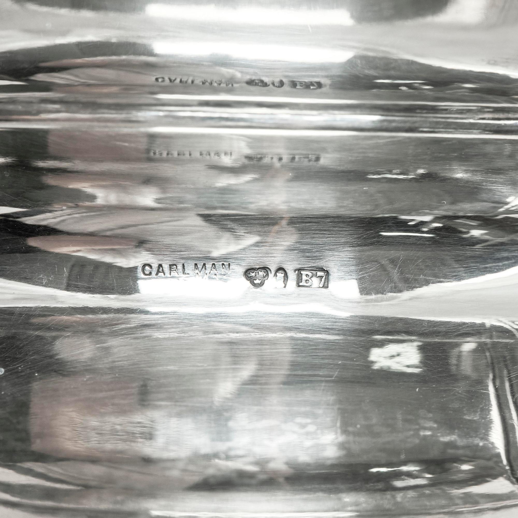 Sven Carlman, a large bowl on foot/wine cooler, silver, company CF Carlman, Stockholm 1904.
