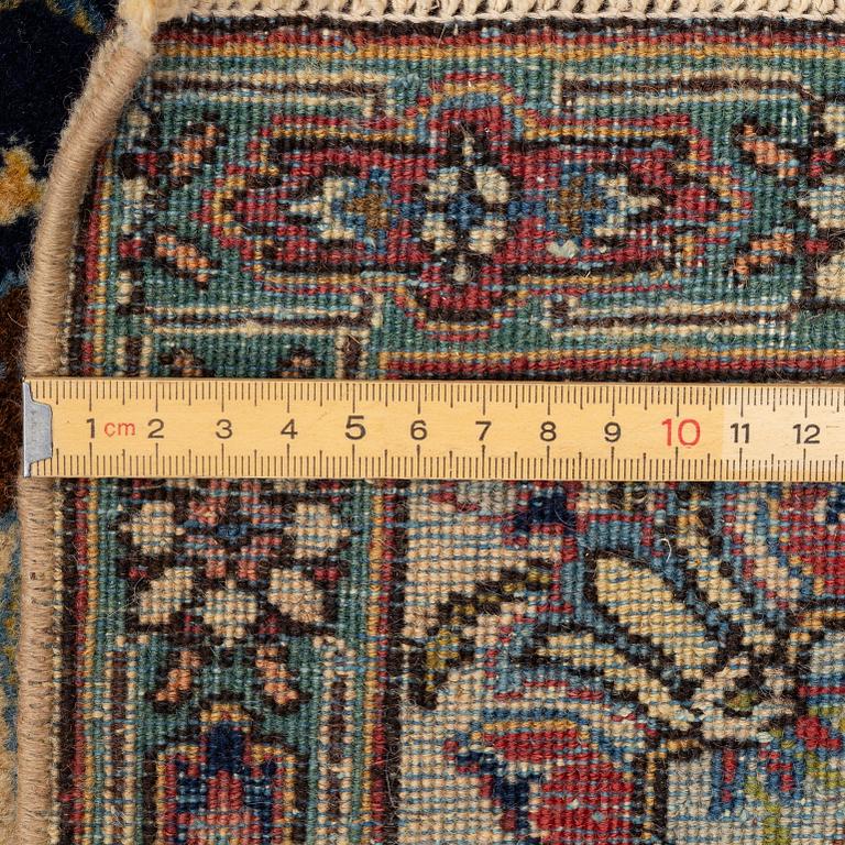 A pair of semi antique Tabriz rugs, Northwest Persia, c. 210 x 136 cm.