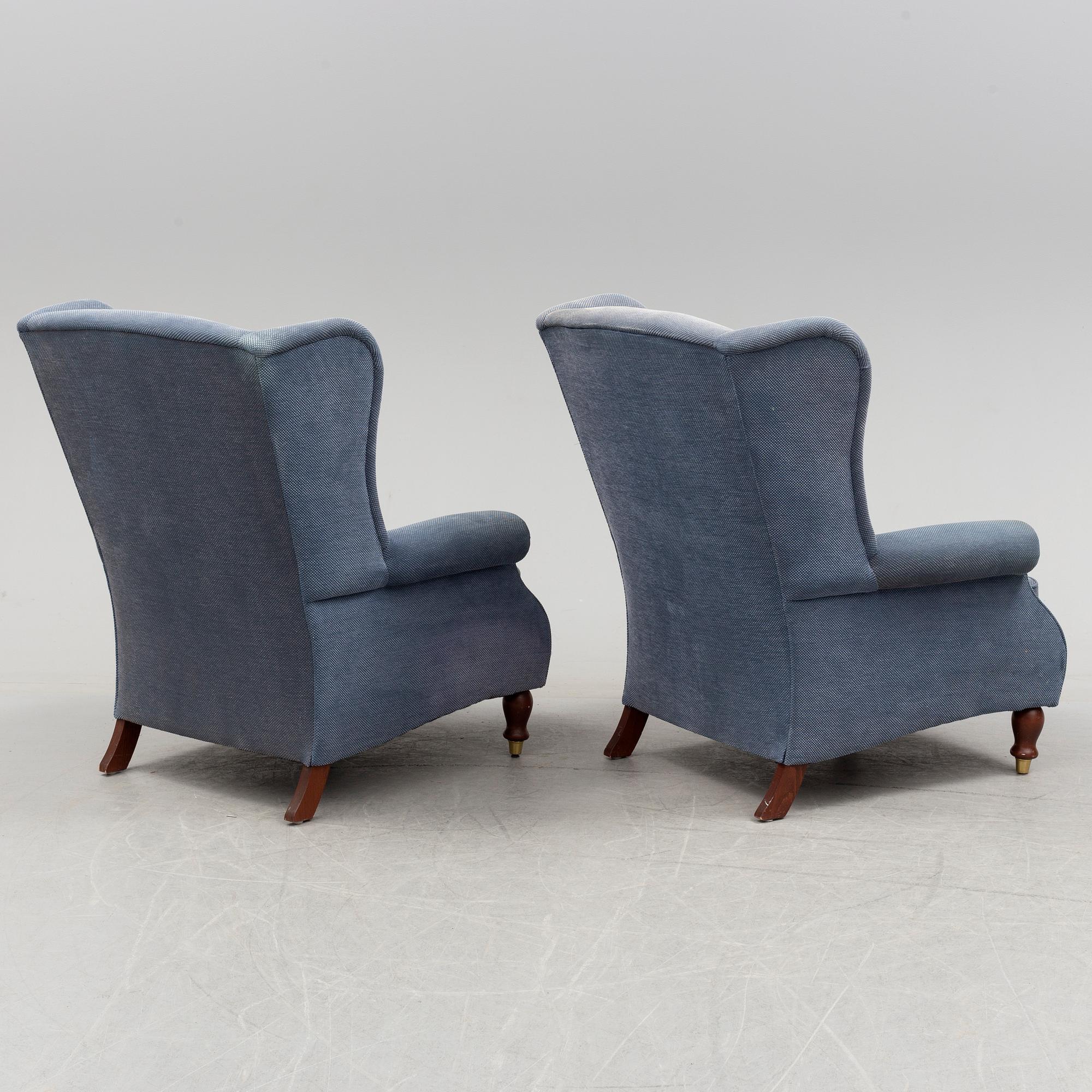 A pair of Parker Knoll 'York' wing chairs.