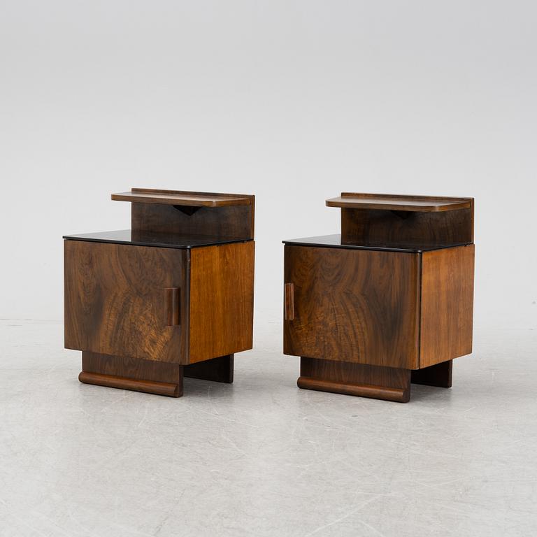 A pair of walnut veneered bedside tables, 1930's/40's.