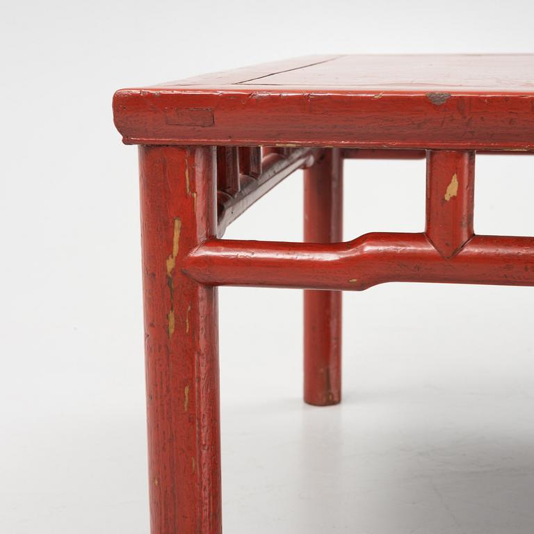 A lacquered table, China, 20th century.