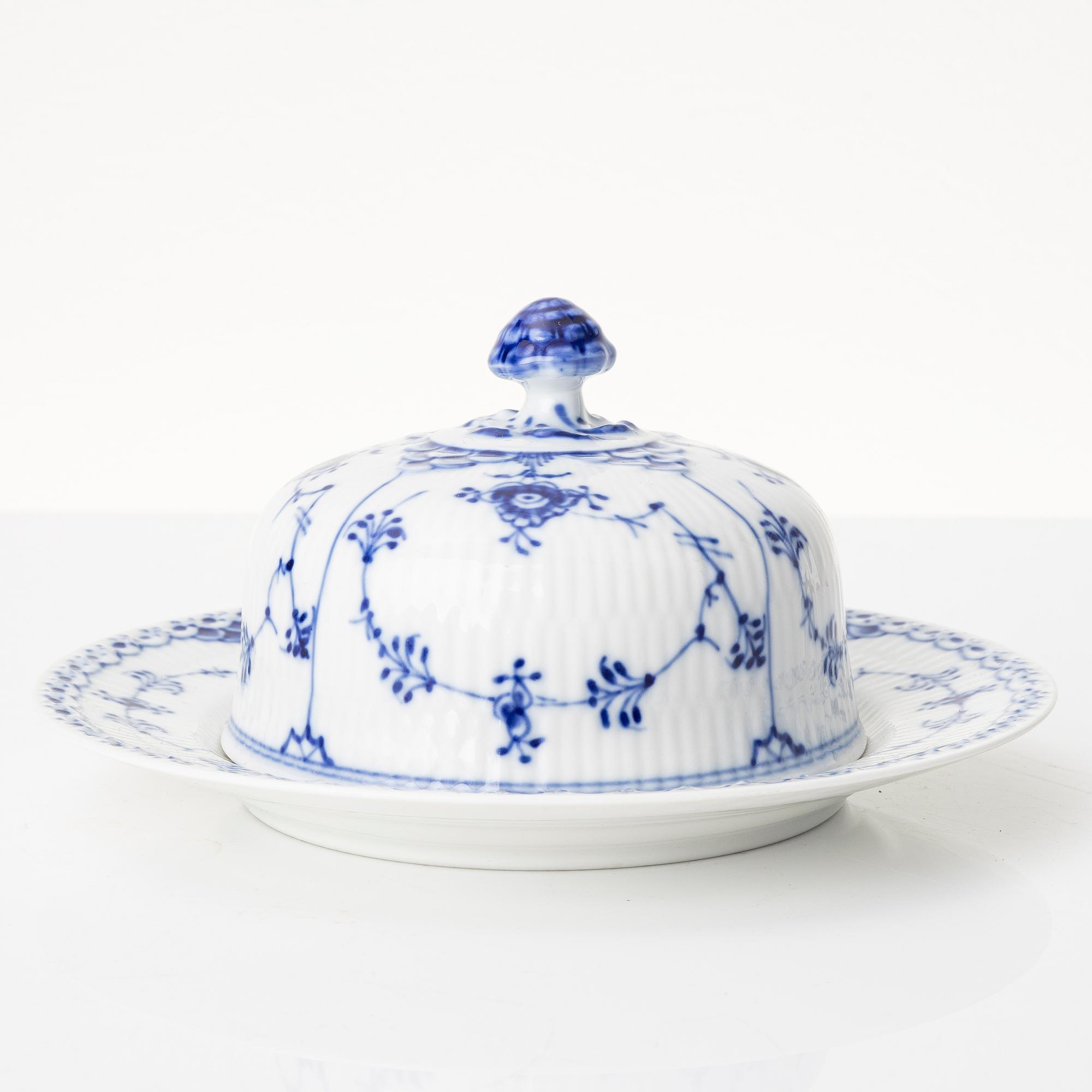 Royal Copenhagen, A 'blue fluted half lace' porcelain butter dish with stand, 1960s.