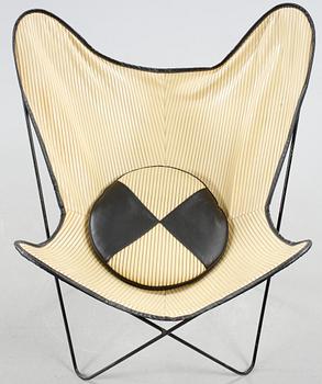 A chair, so called bat chair, made in the mid 20th century.