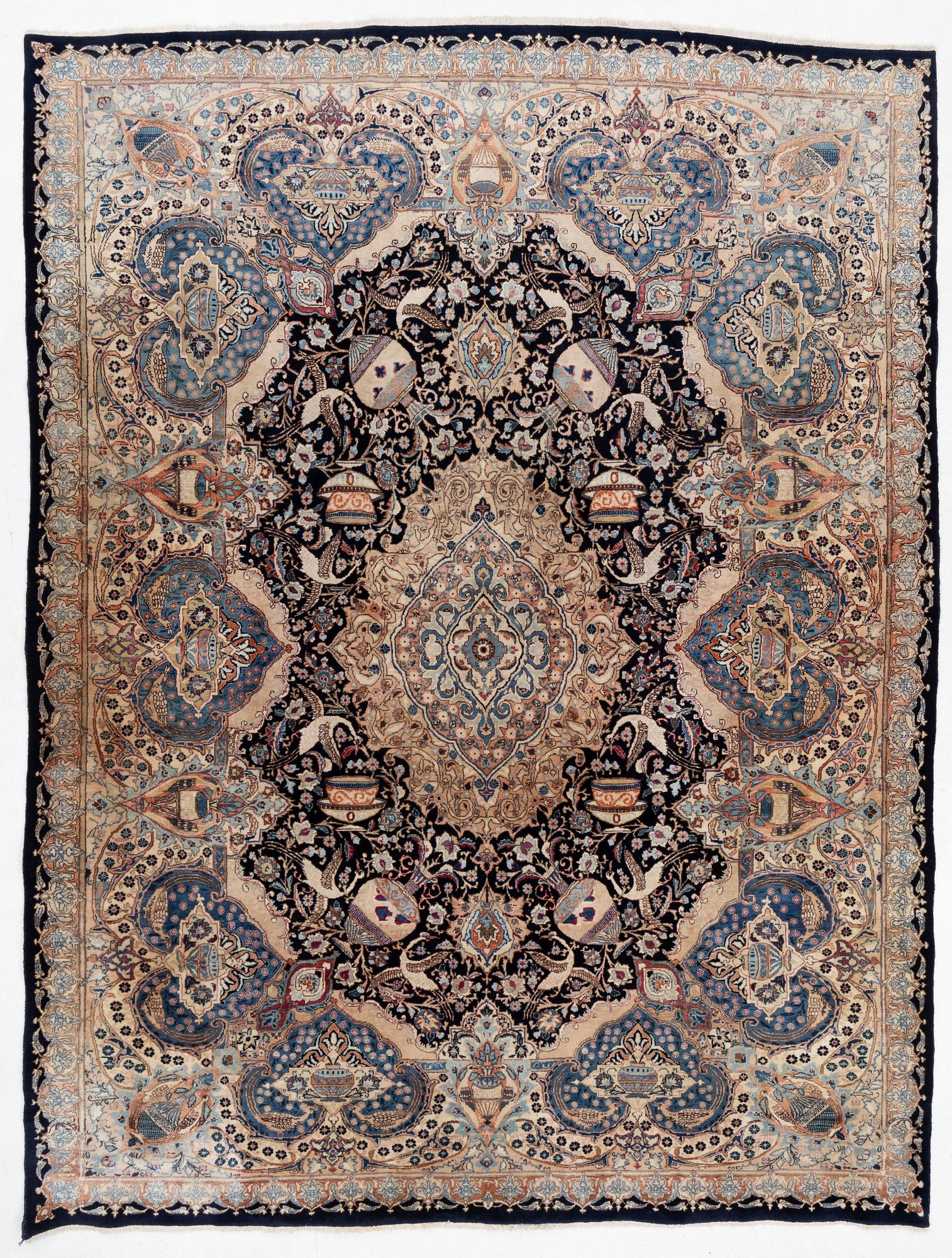 An oriental carpet, circa 390 x 302 cm.