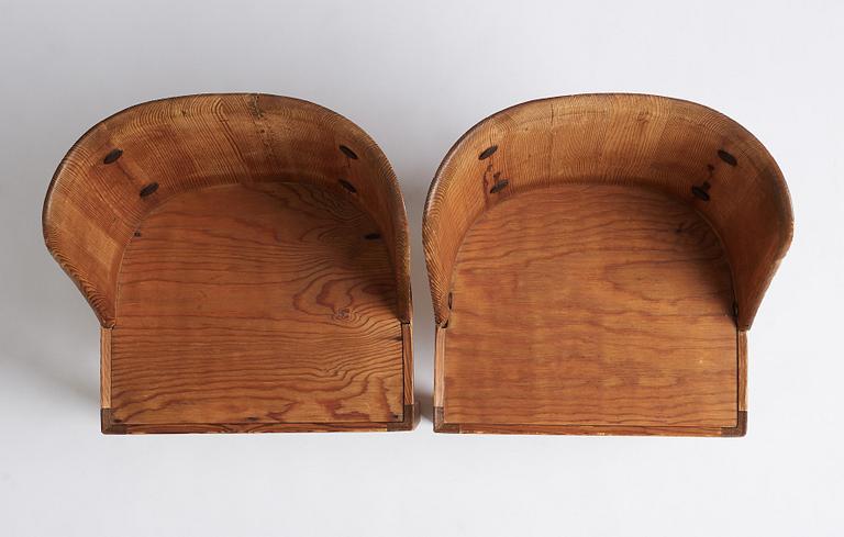 Axel Einar Hjorth, a pair of stained pine 'Lovö' chairs, Nordiska Kompaniet Sweden 1930s.