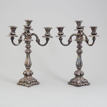 A first half of the 20th century pair of silver candelabras.