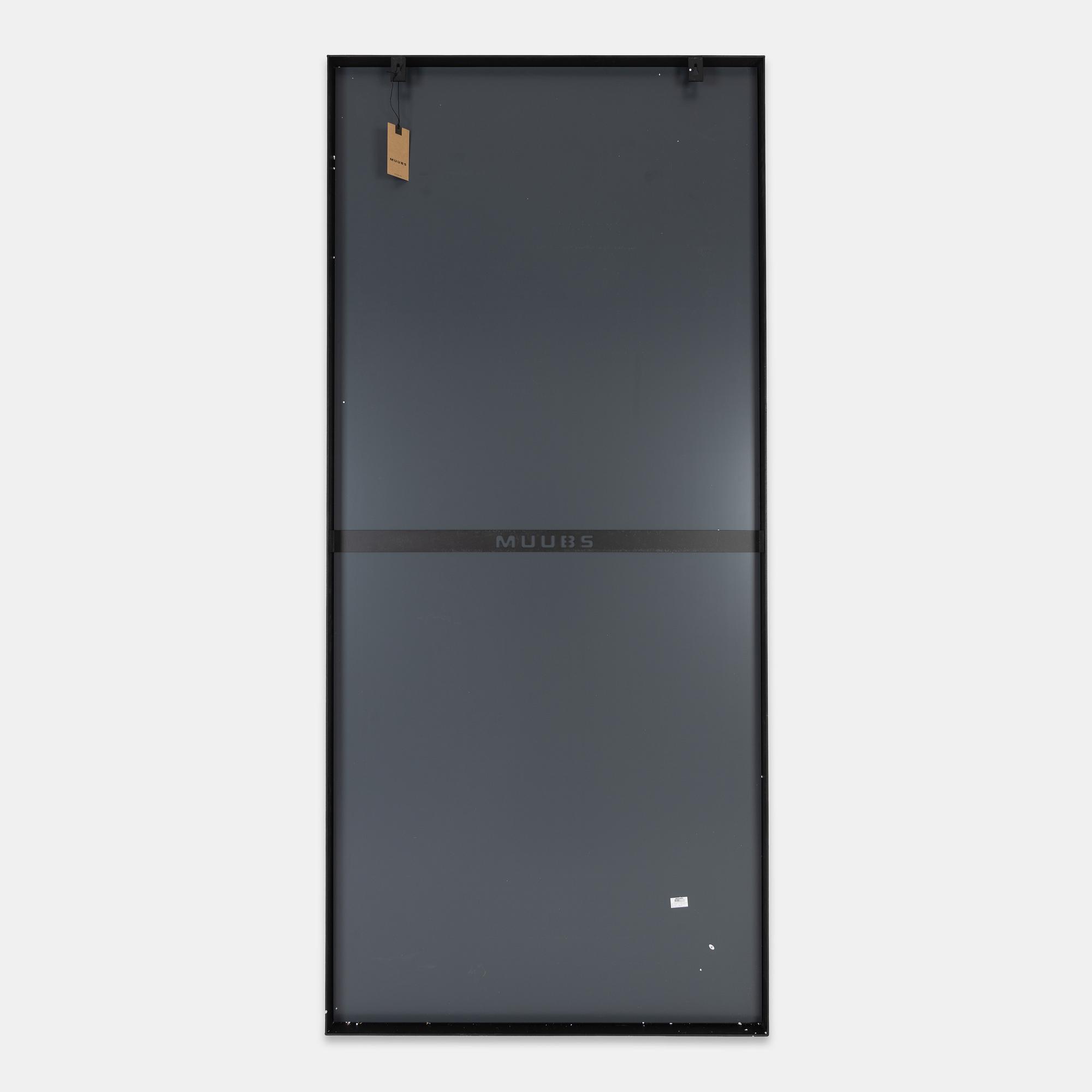 A 'Washington' mirror with steel frame from Muubs.