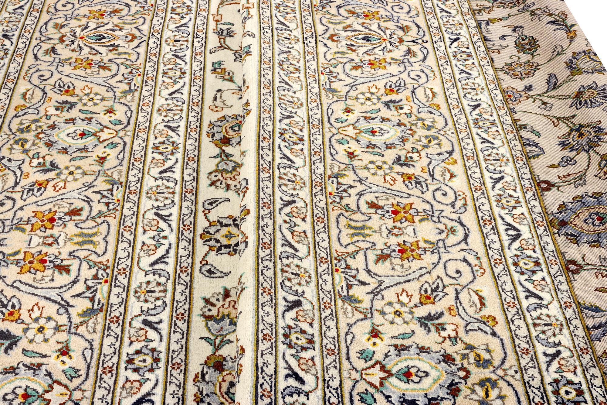 A Kashan carpet, c. 387 x 290 cm.
