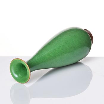 A Chinese apple-green-glazed vase, Qing dynasty.