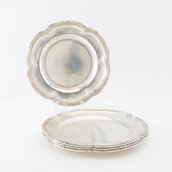 Four pieces of silver around 1900.