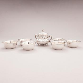 A lidded silver sugar bowl and a set of six silver bowls, Germany.