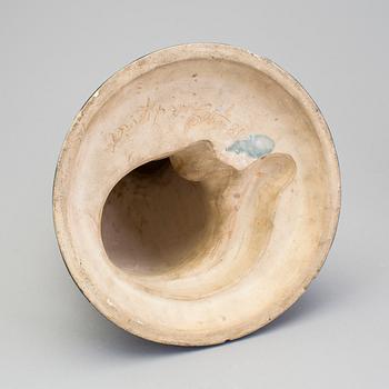 SKULPTUR, oidentifierad konstnär, "Lindqvist", Kakelugnsfabriken, Arbro, Hälsingland,  daterad 1891.