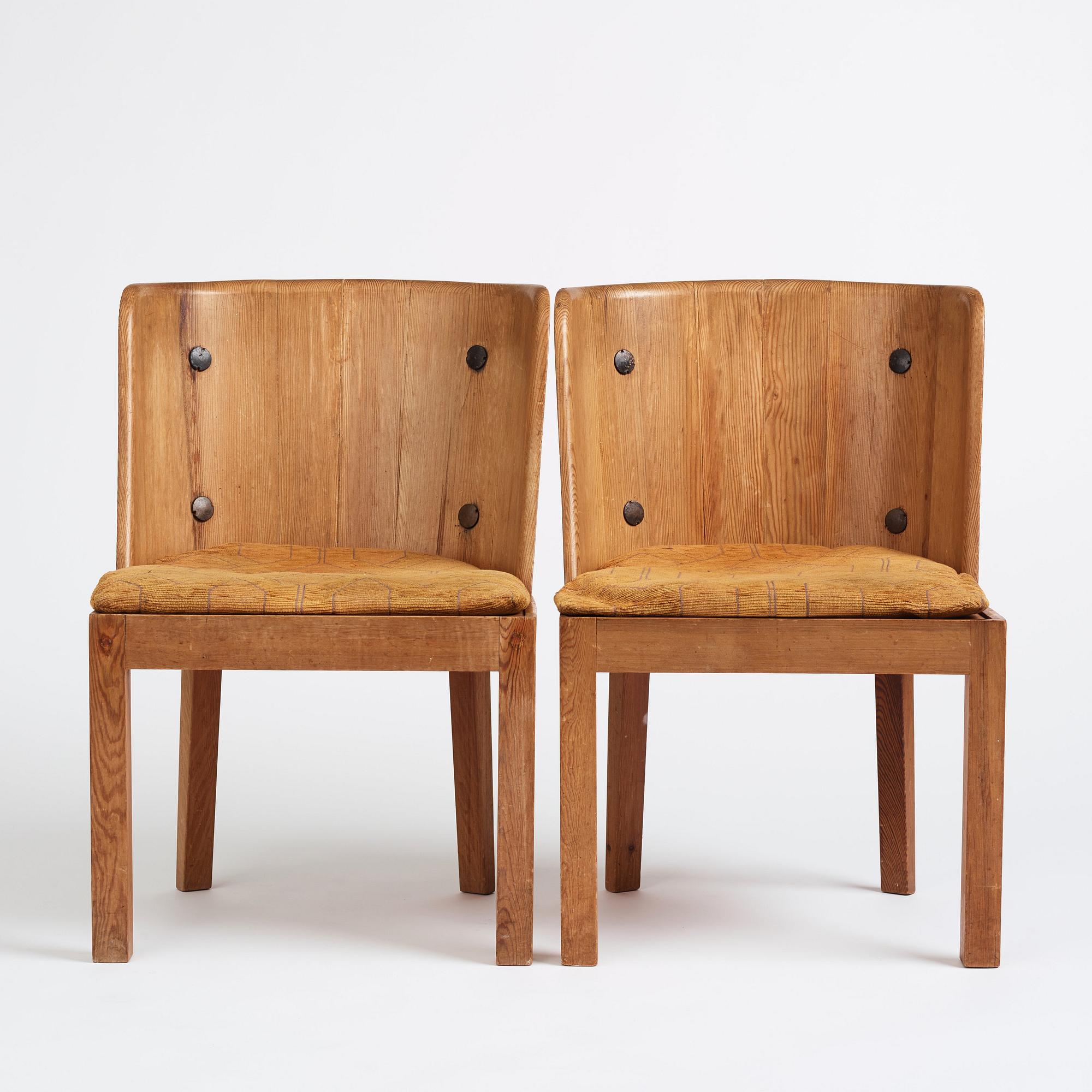 Axel Einar Hjorth, a pair of stained pine 'Lovö' chairs, Nordiska Kompaniet, Sweden 1930s.