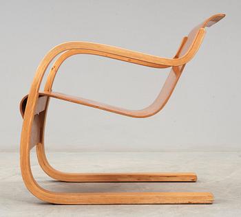 An Alvar Aalto model nr 31 birch armchair, executed on license by Aalto Design Hedemora Sweden 1945-54.