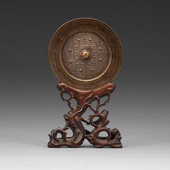 Ana archaistic bronze mirror.