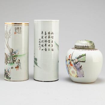 Two Chinese famille rose hat stands and a jar with cover, 20th century.