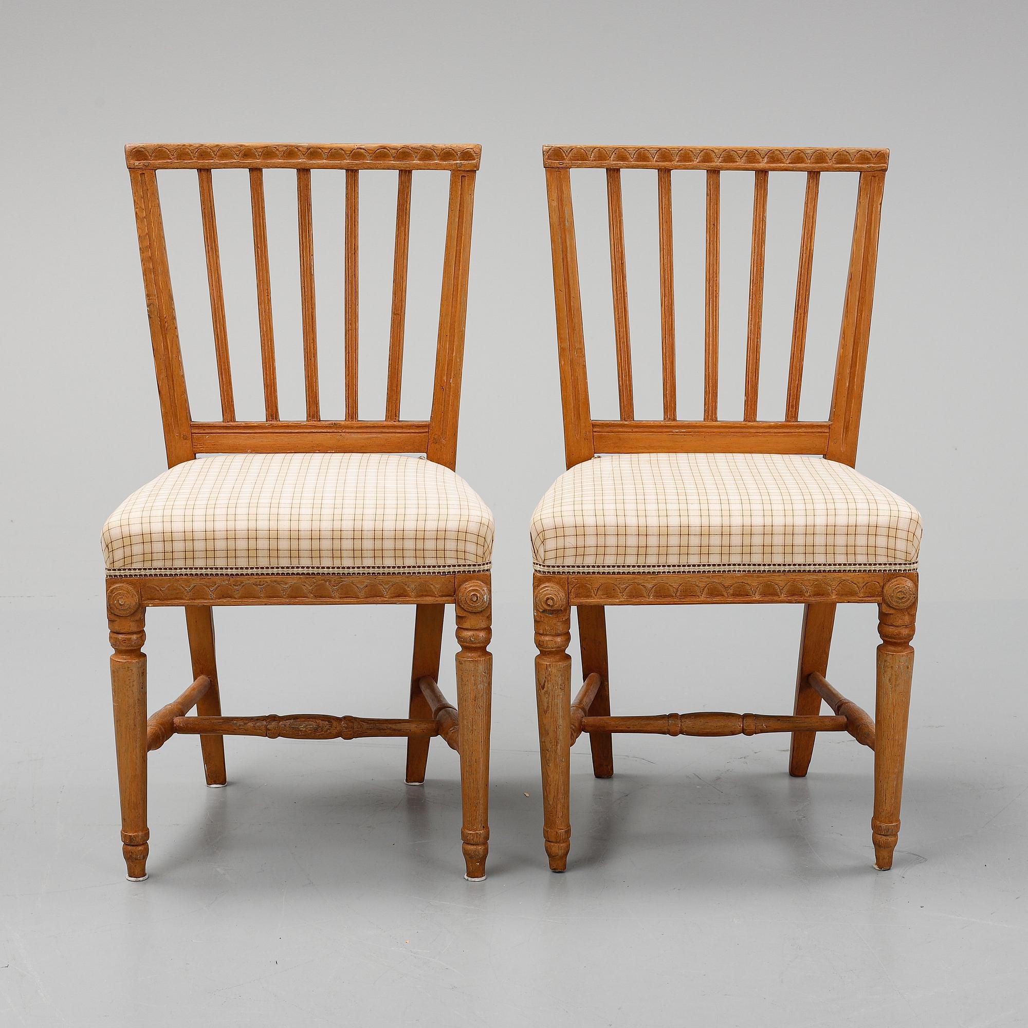 A pair of gustavian chairs, early 19th century.