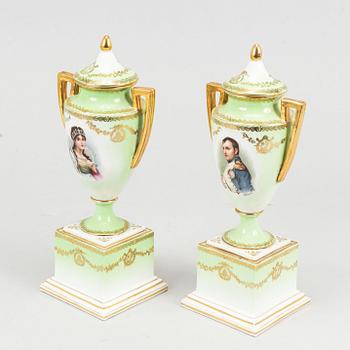 A pair of porcelain urns, possibly naples, first half of the 20th century.