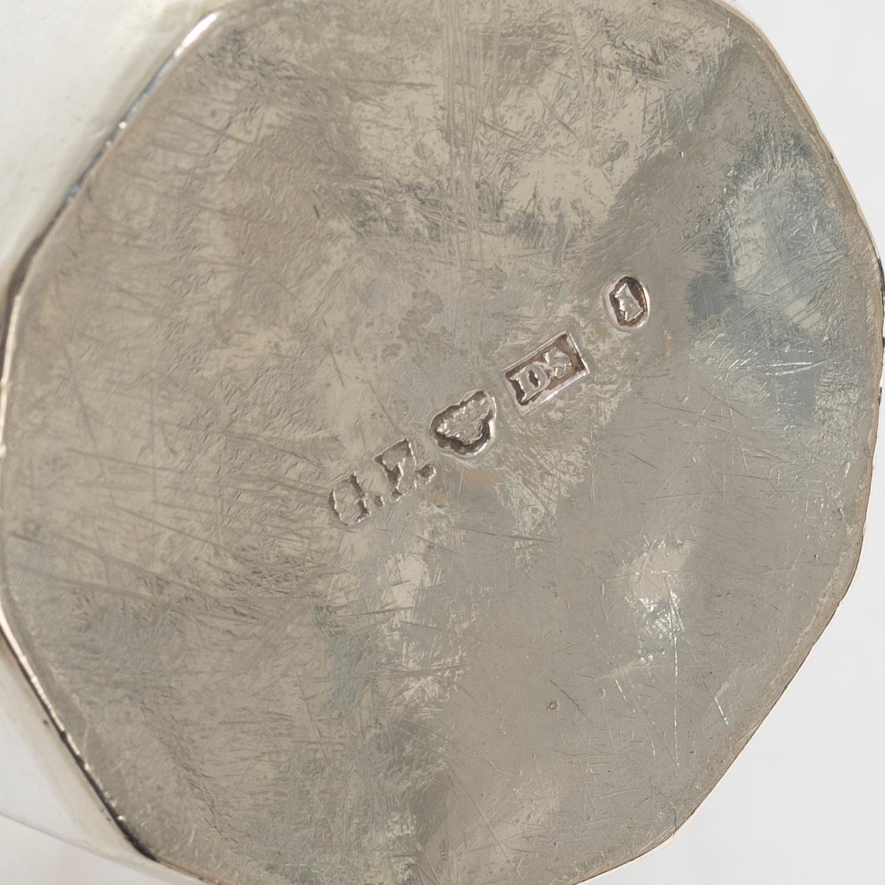 Three silver beakers, a vase and a cup, Sweden and Denmark, 19th-20th century.