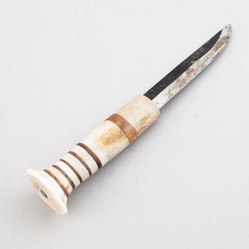 Lars Pirak, a Sami reindeer horn knife, signed Lars Pirak.