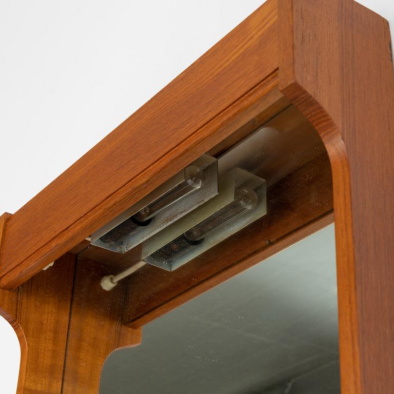 A Swedish teak mirror, 1960's.