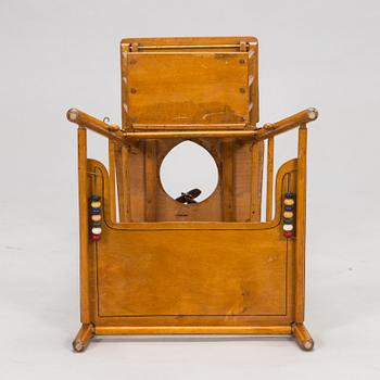 Syöttötuoli, 1900-luvun puoliväli.