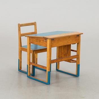 A SCHOOL DESK AND A CHAIR, SECOND HALF OF 20TH CENTURY.