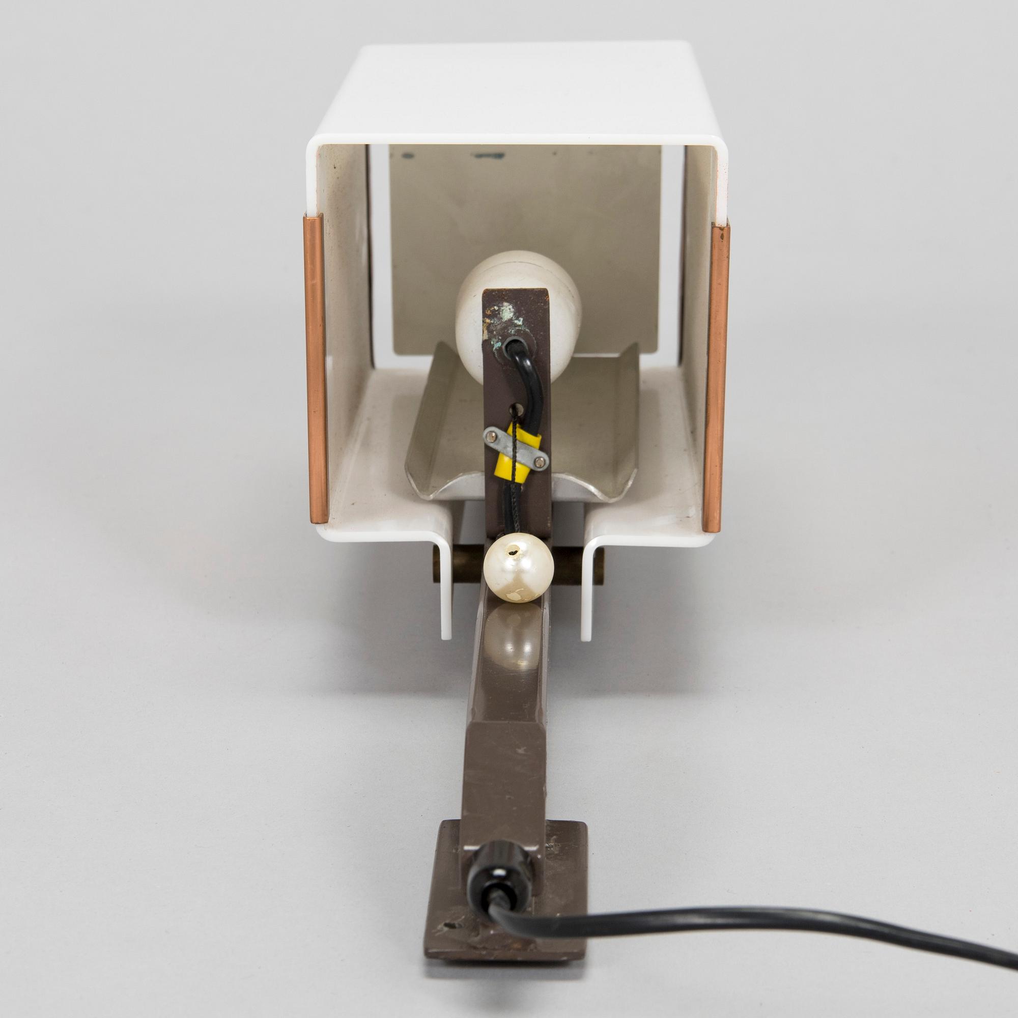 Lars-Gunnar Nordström, a 1970's wall light for Metallimestarit.