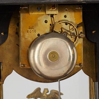 A boulle style table clock, circa 1900.