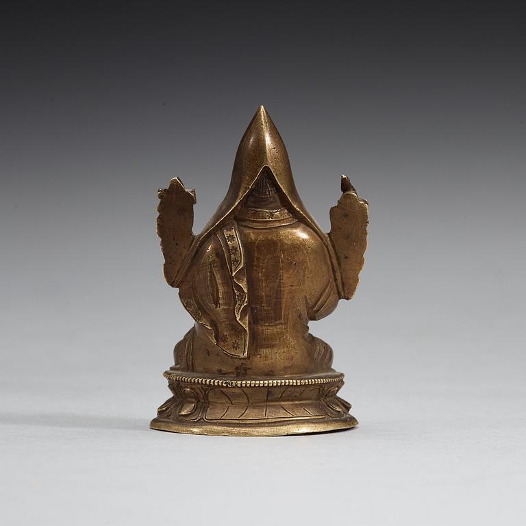 A seated bronze figure of Tsong Khapa, Tibet, 19th Century.