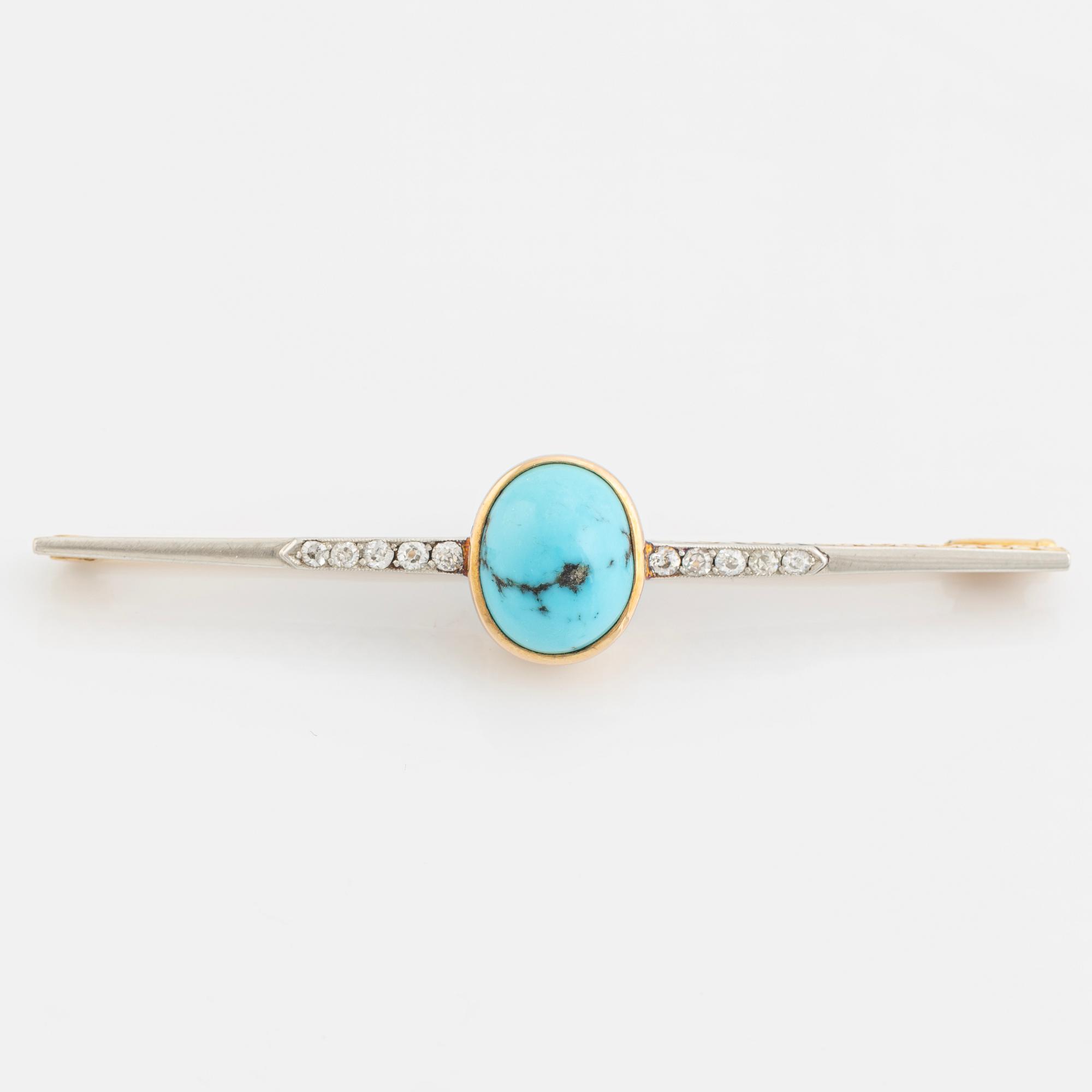 An 18K gold brooch set with a turquoise and old-cut diamonds.