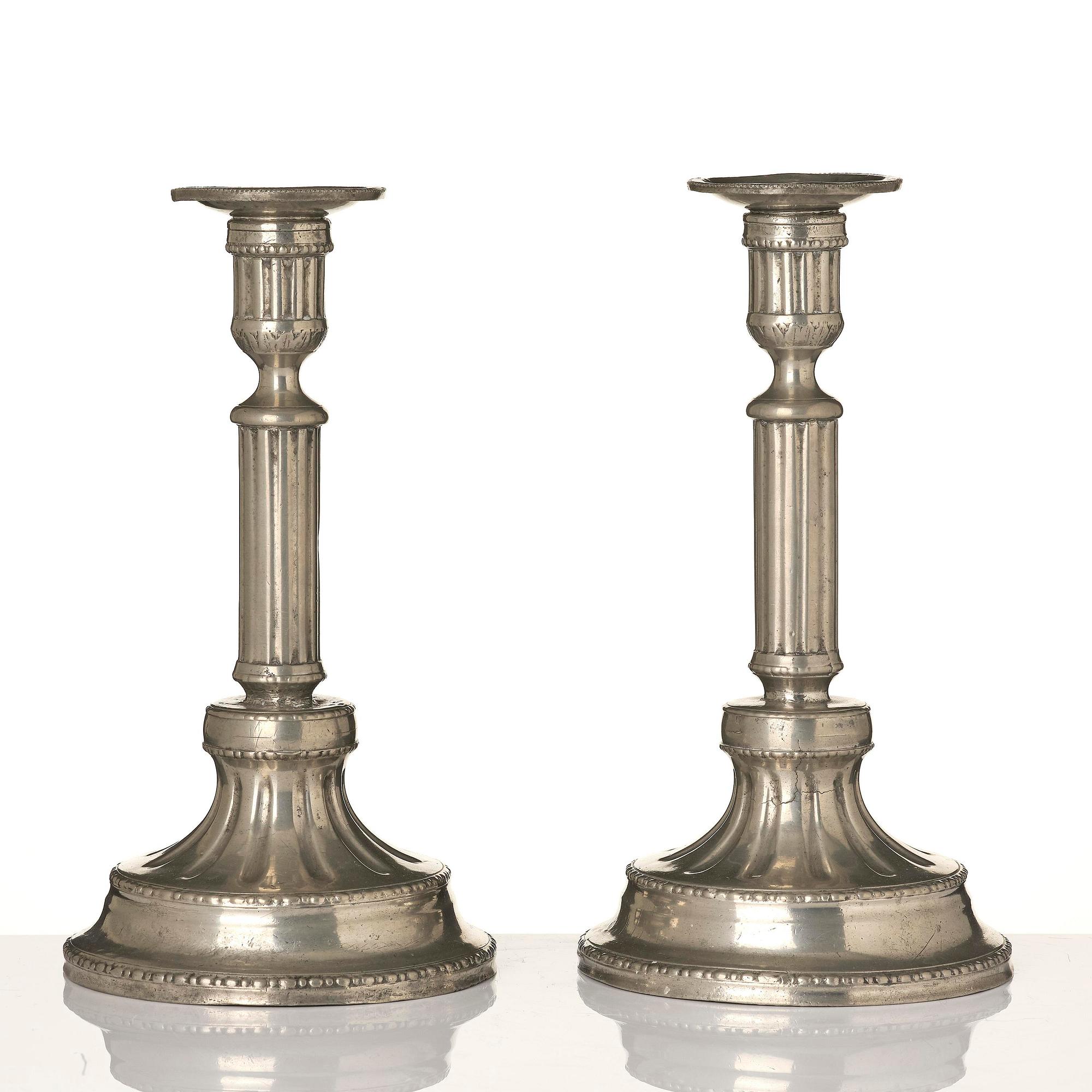 A pair of Gustavian pewter candlesticks by P. Gillman, Stockholm 1786.