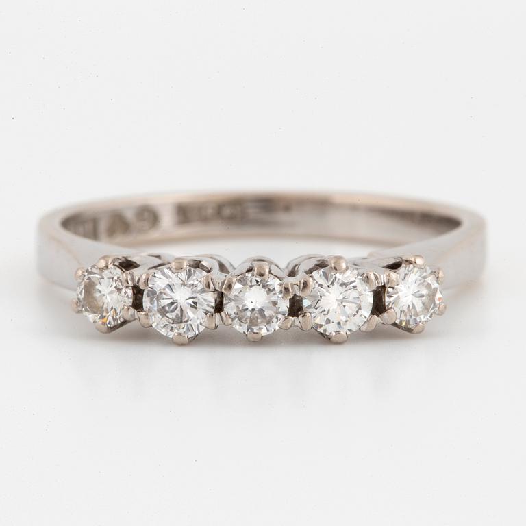 Half eternity brilliant-cut diamond ring.