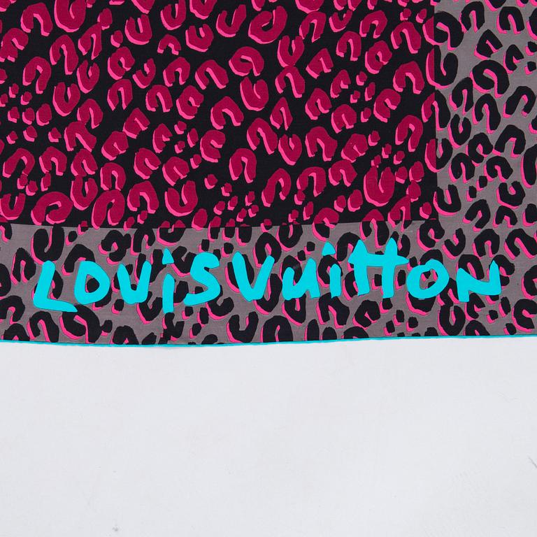 Louis Vuitton, a silk scarf.