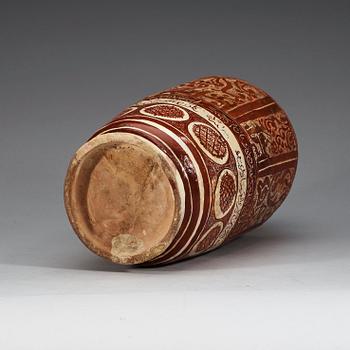 A JAR, lustre-decorated pottery. Height 32 cm. Central Persia (Iran) 12-13th century. Kashan style.