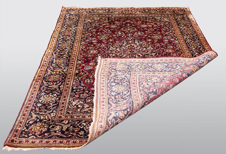 A carpet, Old silk, Kashan, ca 200 x 128 cm.