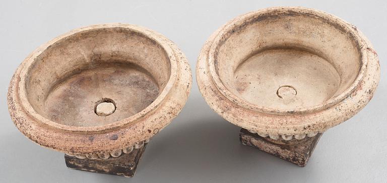 A pair of English 19th century stoneware garden urns.