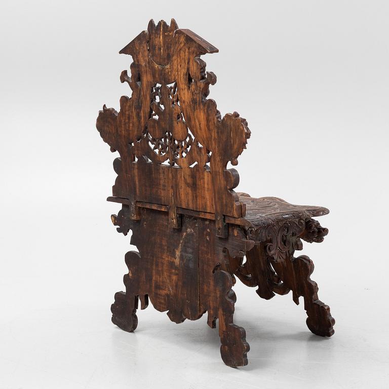 A Neorenaissance 'Sgabello' carved chair, late 19th century.