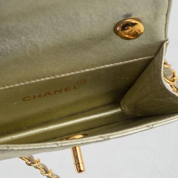 Chanel, micro flap bag, 1989-1991.