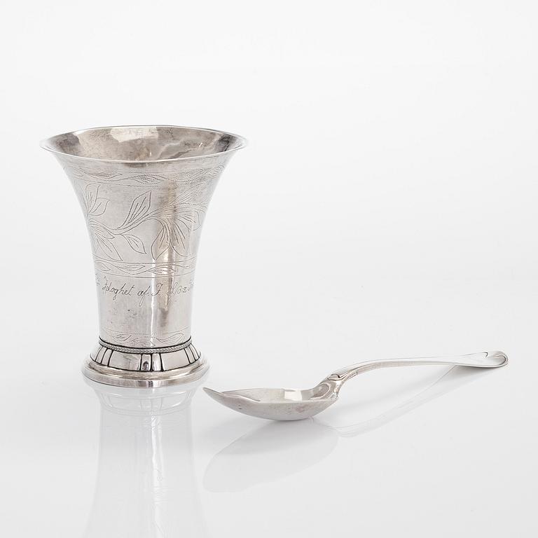 A silver beaker, maker's mark Isak Carlstedt, Porvoo ca. 1831, and silver spoon by Carl Fredrik Borgström, Turku 1803.