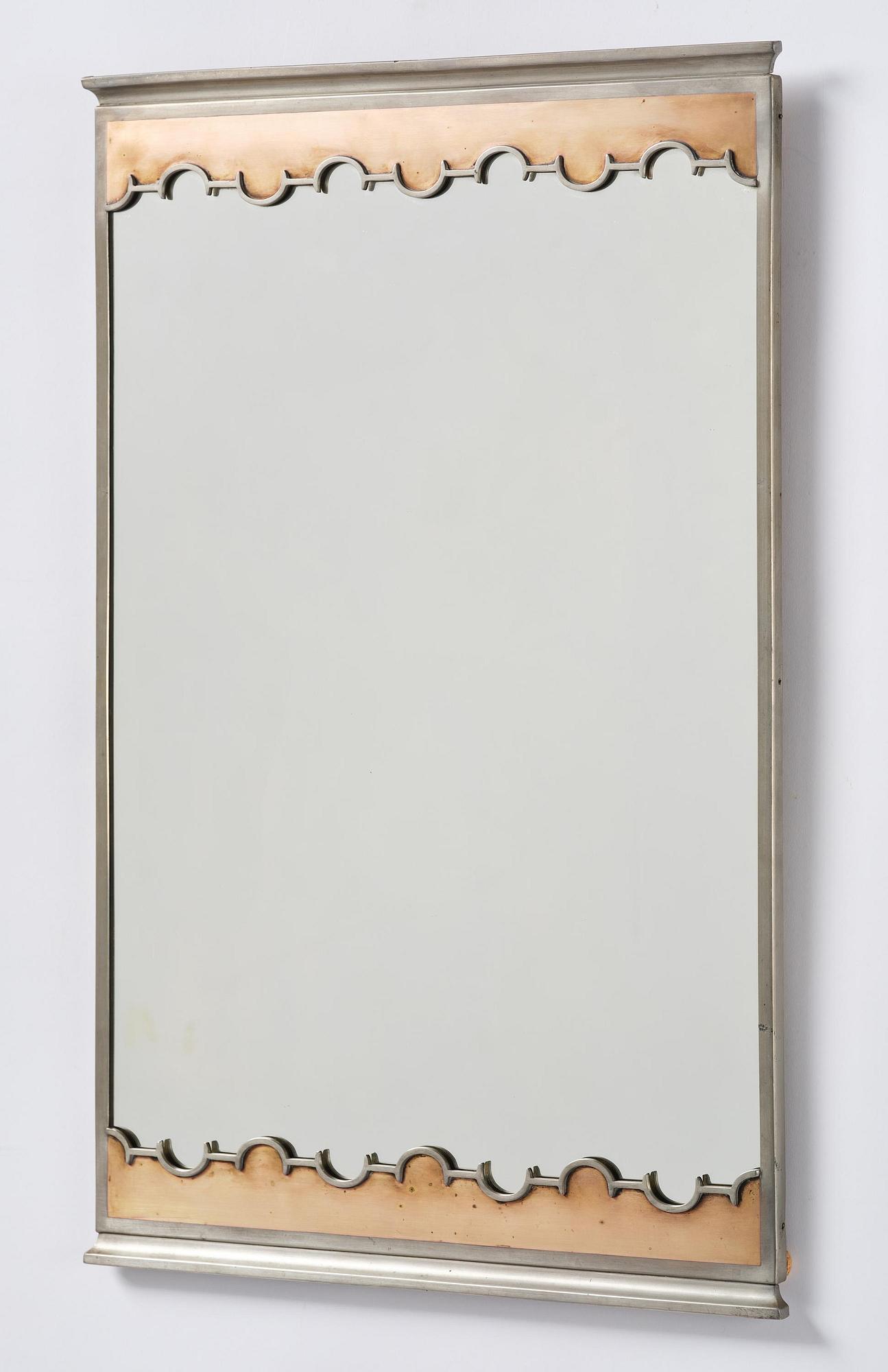 Nils Fougstedt, a rare pewter and brass wall mirror model A 679, Firma Svenskt Tenn, Stockholm, 1932.