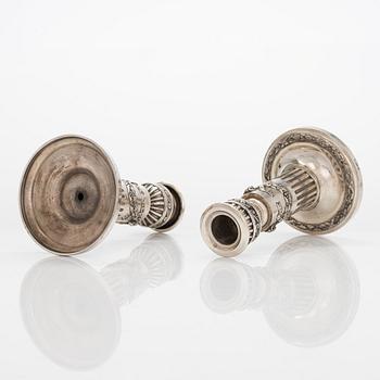 A pair of Saglier Frères silver plated Louis XVI-style candlesticks from around year 1900.