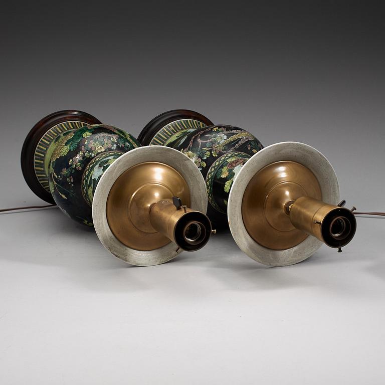 A pair of famille noir vases mounted as lamps, Qing dynasty, 19th Century.