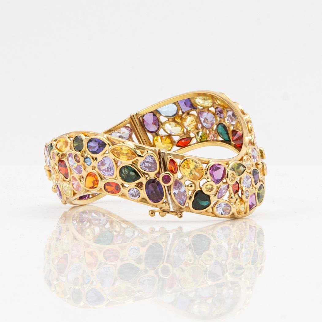 Armring, 18K gold with coloured gemstones, Italy.