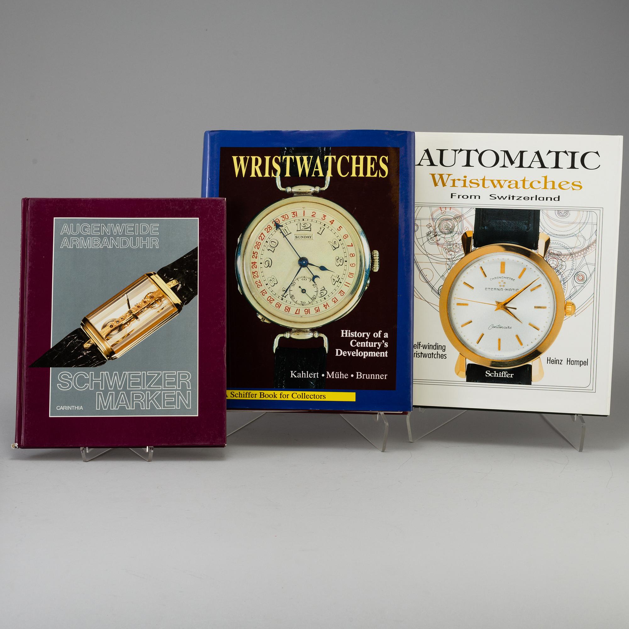 A lot of 4 books regarding watches.